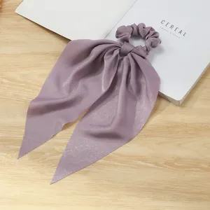Elegante elastico per capelli in raso viola con lunghi nastri per donne e ragazze.