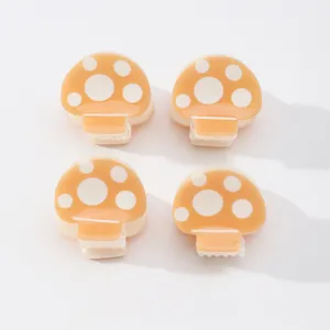 Set of 4 cute orange mushroom hair claw clips with white polka dots, small mini hair accessories.