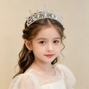 Crystal rhinestone princess tiara crown detail shot, elegant hair accessory for kids.