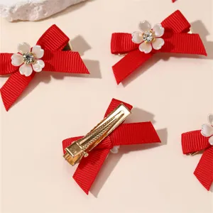 Red bow hair clips with white floral rhinestone center, cute sweet hairpin set for women.