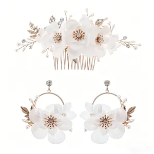 Bridal hair comb and earrings set with white fabric flowers, pearls and rhinestones.