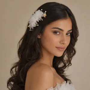 Bridal hair comb with white fabric flowers and pearls, elegant wedding hair accessory for women.