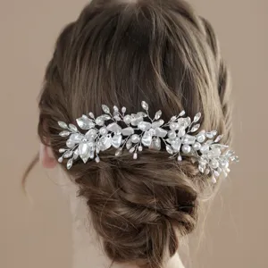 Elegant silver bridal hair vine with pearls and crystals for wedding updo styling main view.