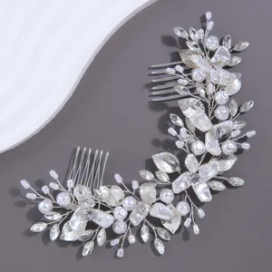Bridal silver flower side hair comb wedding hair accessory for bridal styling and party.