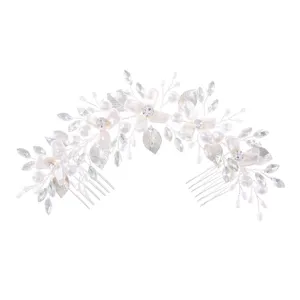 Elegant silver bridal hair comb with pearls and crystals, perfect for wedding styling.