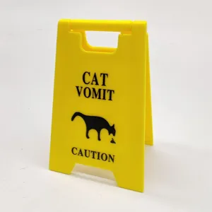 Funny mini cat vomit caution warning sign novelty desk decoration yellow plastic toy