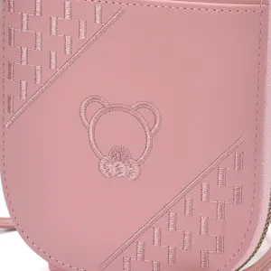 Pink faux leather crossbody phone bag featuring cute embroidered bear design for daily use.