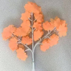 Artificial maple leaf branches orange fake plant stems for autumn home decor and garden display.
