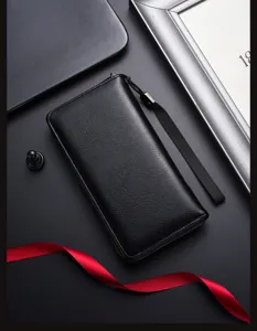 Men's long black leather wallet with zipper closure and wrist strap, premium business style.