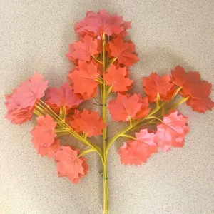 Artificial red maple leaf branch fake plant stems for autumn home decor and outdoor landscaping.