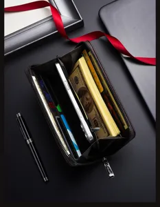 Detailed view of men's long leather wallet with multi-card slots, cash compartments, and phone space.