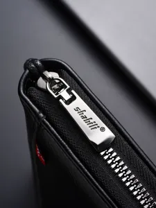 Men's black leather long wallet clutch bag detailed main view with premium metallic zipper.