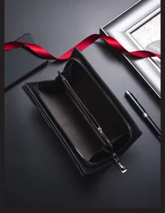 Black men's long wallet with zip-around design, large capacity and multiple card slots.