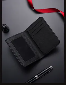 Detailed view of the black textured men's bifold card holder wallet with multiple slots.