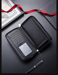 Billetera larga de cuero para hombre con doble cremallera y múltiples ranuras para tarjetas.
