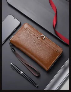Portefeuille long pour homme en cuir marron avec fentes pour cartes et fermeture éclair.