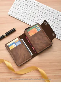 Detailed view of the vintage brown leather accordion card holder with multiple slots.