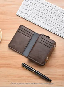 Detail view of men's vintage brown leather bifold wallet with card slots and zipper.
