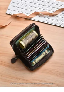 Detail view of brown leather accordion card wallet showing multiple card slots and interior.