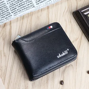 Detailed shot of black leather short wallet with zipper closure and card slots for men.