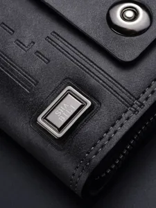 Premium black leather card holder wallet for men with secure snap button and metal logo plaque.