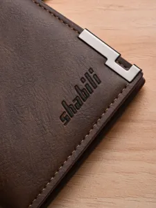 Classic brown leather men's wallet with metal corner protector and card slots main view.