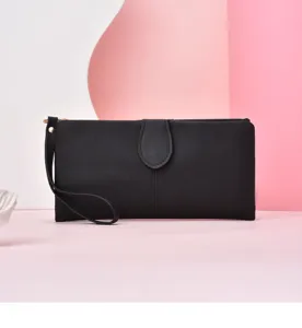 Detailed view of elegant black women's long wallet clutch with wrist strap and zipper.