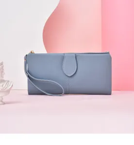 Close-up detail view of a blue long wallet featuring a convenient wrist strap and secure zipper.