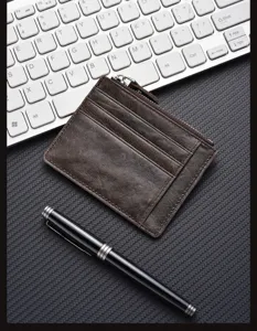 Classic brown genuine leather card holder with multiple slots and zipper coin pocket for daily use.