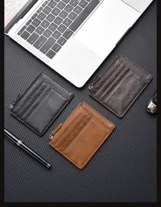 Genuine leather card holder wallet for men and women with zipper coin pocket and multiple slots.