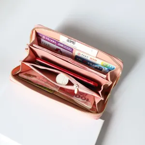 Women long zipper wallet large capacity clutch purse with multiple card slots and phone pocket.