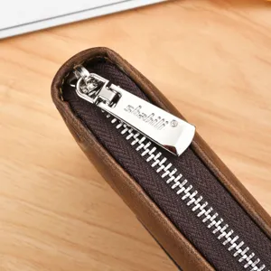Men's retro short zipper wallet brown leather card holder casual business purse detail view.