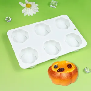 Detailed view of 6-cavity flower silicone baking mold with finished dessert display.