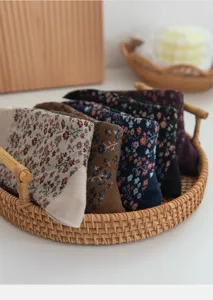 Retro floral cotton mid-tube socks set, cozy daily wear women socks in woven basket.
