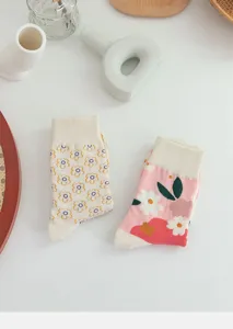 Sweet floral mid-calf socks detail, cute daisy and pink flower patterns for women spring.