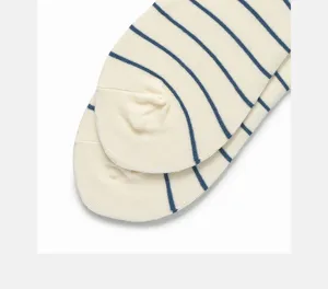 Close-up of cotton striped boat socks in off-white and blue, breathable summer ankle socks.