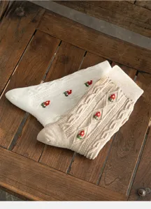 Vintage cable knit floral cotton mid-tube socks for women, cozy autumn winter apparel detail.