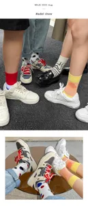 Unisex trendy mid-calf socks with irregular color block and polka dot designs for daily wear.