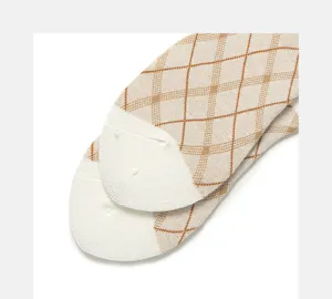 Retro argyle pattern cotton socks for women, classic academy style knit hosiery detail.
