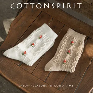 Women cable knit mid-calf cotton socks with retro floral embroidery, autumn winter cozy wear.