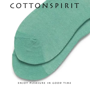 Comfortable solid green cotton socks for women, breathable short design for summer daily wear.