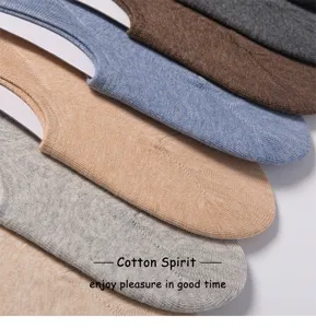 Detail shot of stacked solid color thin invisible boat socks, soft and breathable summer wear.