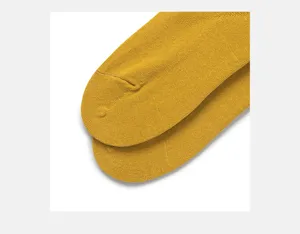 Mustard yellow cotton women boat socks detail shot showing soft texture and fine knit.