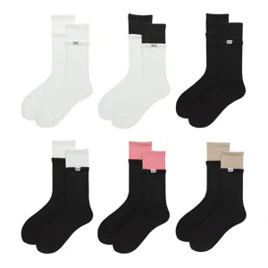 Layered colorblock mid-calf socks for men and women, stylish sports and casual wear.