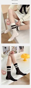 Women sheer mesh mid-tube socks with polka dots and delicate lace ruffles, balletcore style.