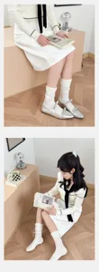 Close-up details of sweet balletcore lace stack socks worn with cute bow flat shoes.