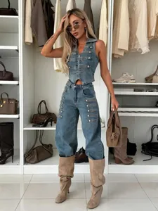 Stylish denim vest and jeans set featuring unique metallic button details in a chic walk-in closet.