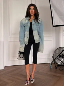 Vintage washed denim jacket for women, loose fit long sleeve lapel coat, casual streetwear style.