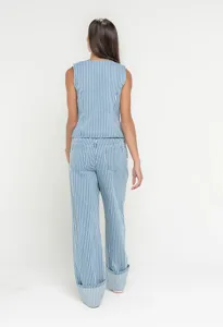 Striped denim vest and matching wide-leg trousers set for stylish autumn street wear.