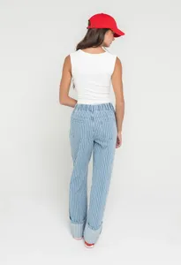 Detail shot of women's casual striped long pants and white vest set, streetwear fashion.